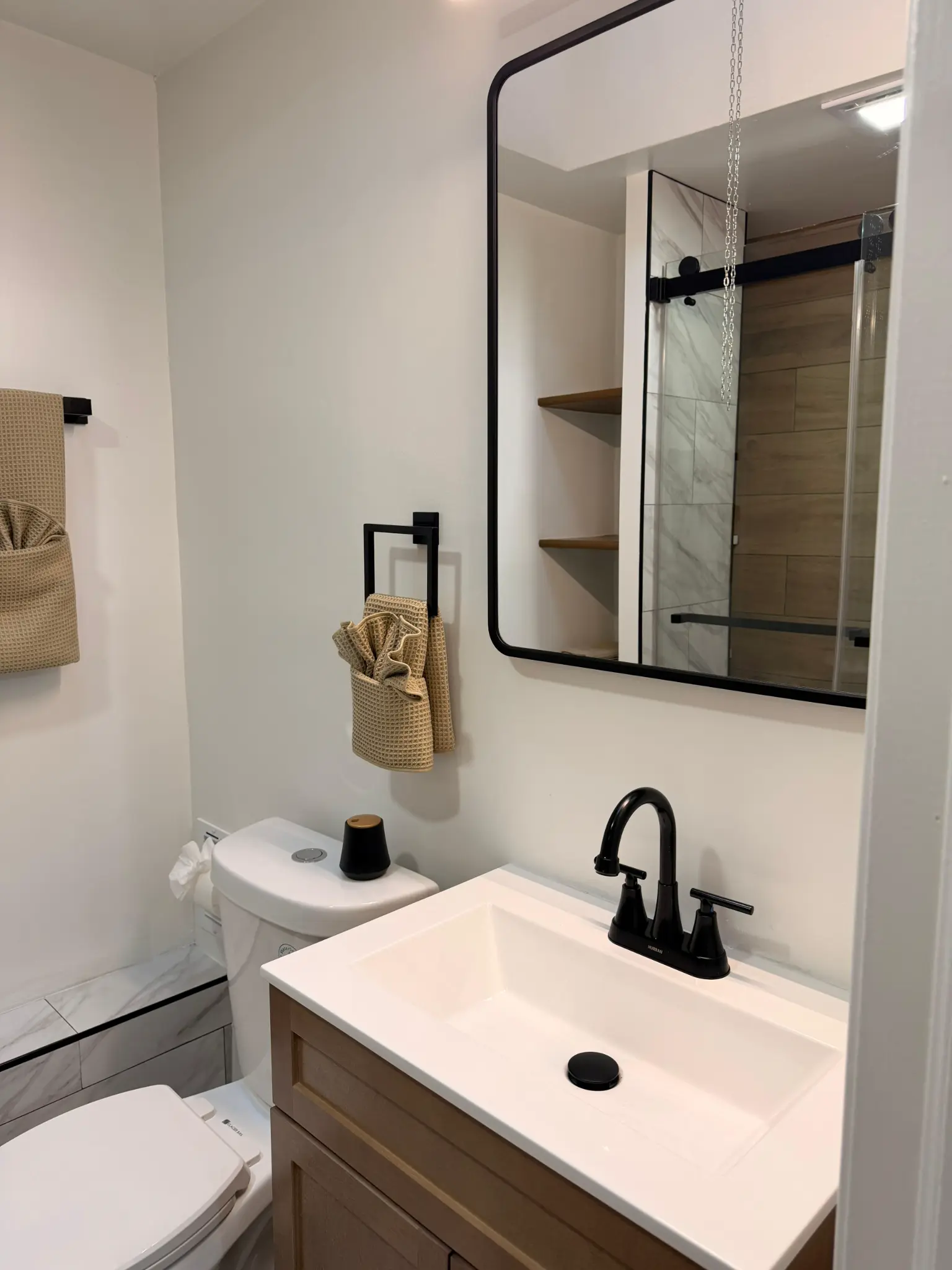 Modern bathroom with clean white sink and mirror