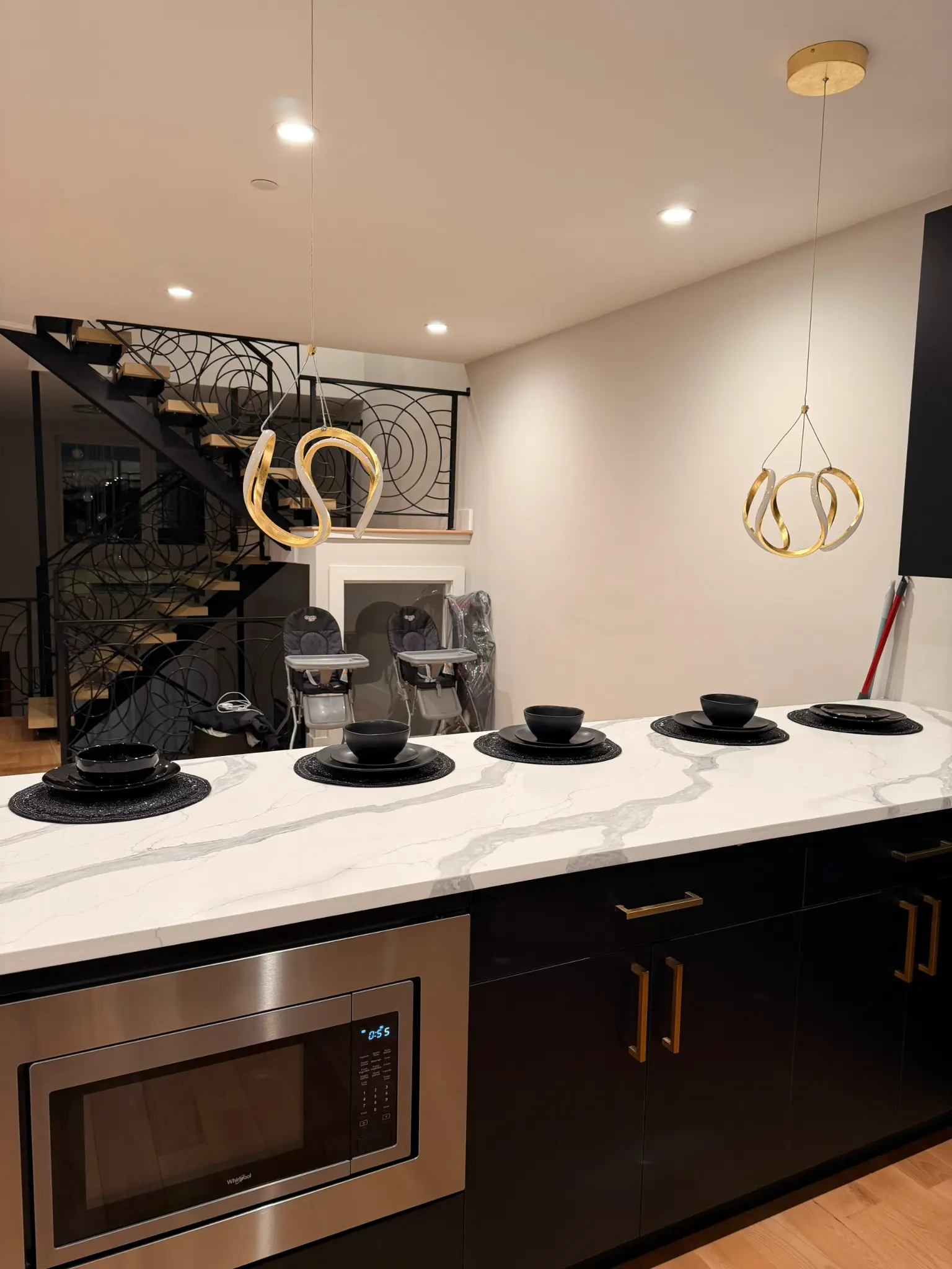 Luxury kitchen with marble island and gold accents