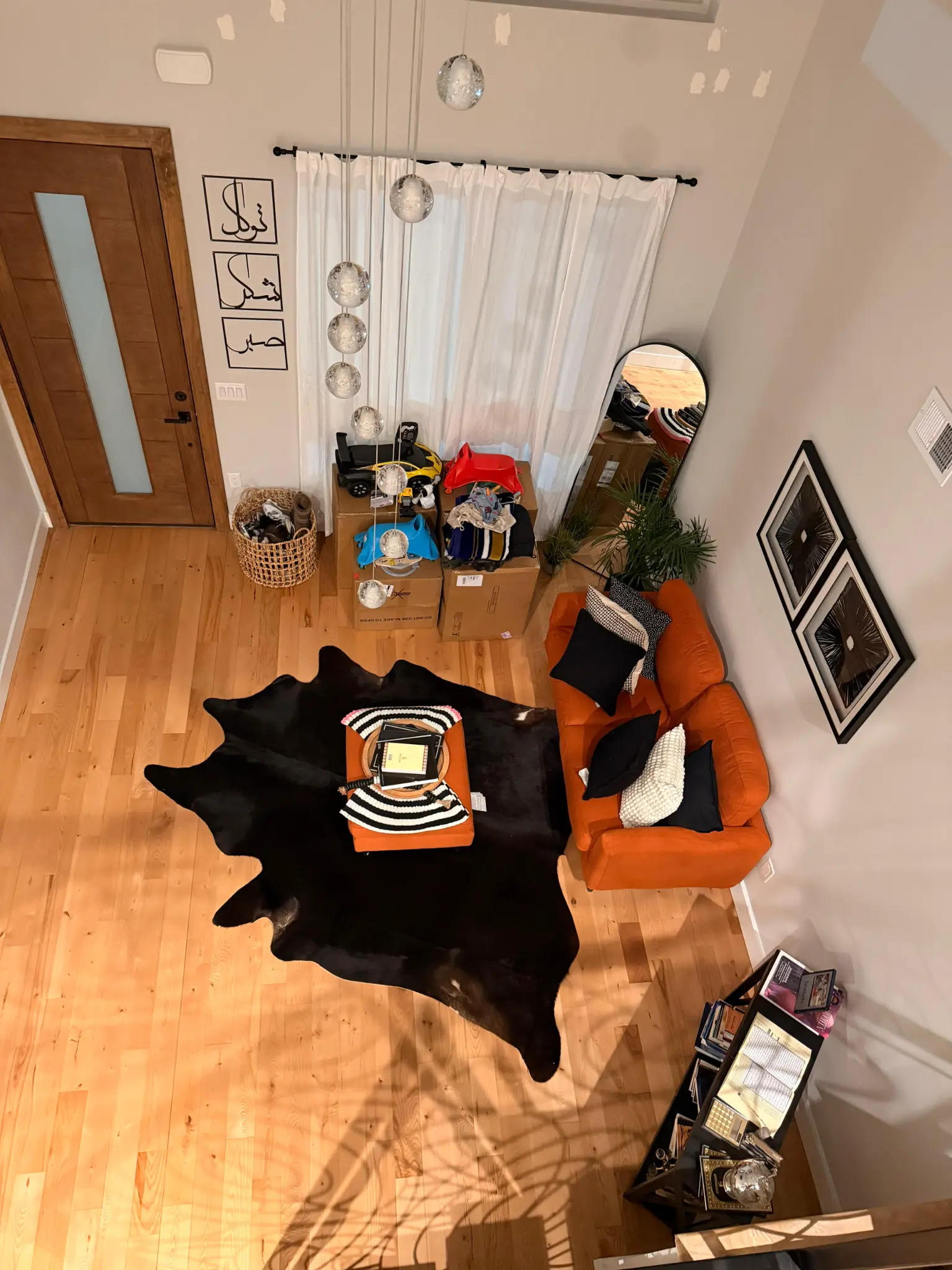 Move-in cleaning — spacious living room with artistic staircase